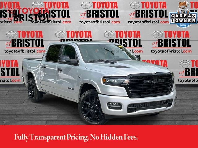 2026 RAM 1500 Laramie in Silver Zynith — front three-quarter view