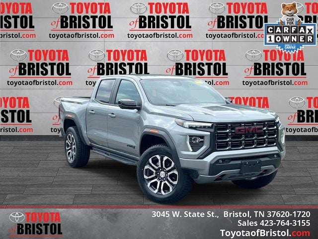 2024 GMC Canyon AT4 in Sterling Metallic — front three-quarter view