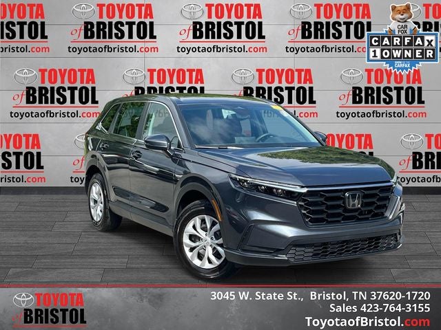 2024 Honda CR-V LX in Meteorite Gray Metallic — front three-quarter view