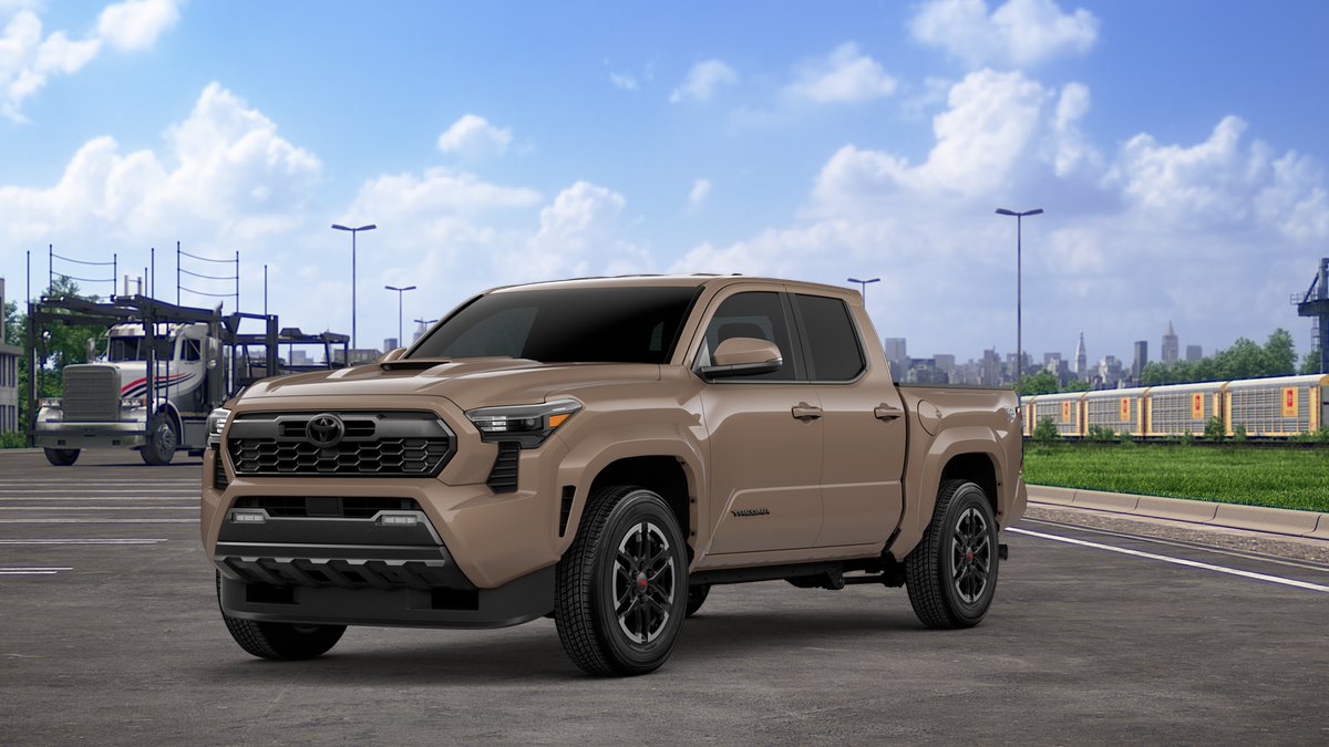 2026 Toyota Tacoma TRD Sport in Mudbath — front three-quarter view