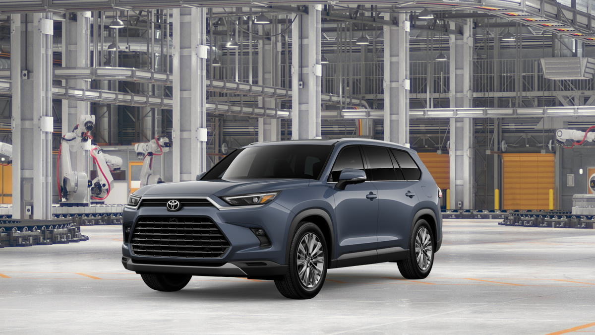 2026 Toyota Grand Highlander Platinum in Storm Cloud — front three-quarter view