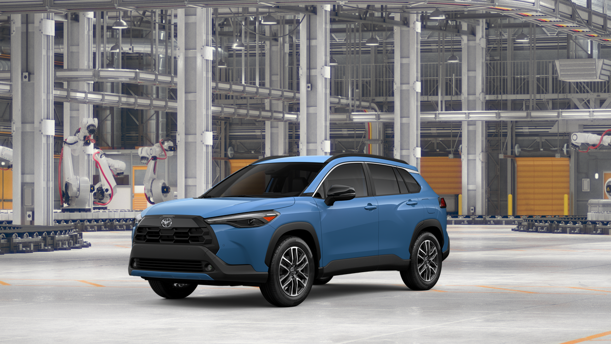 2026 Toyota Corolla Cross XLE in Cavalry Blue — front three-quarter view